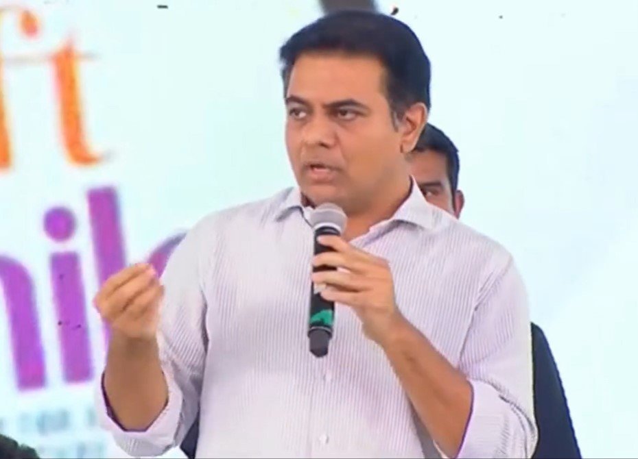 Minister Sri KTR speaking at a programme in Sircilla held to distribute tabs to students under GiftASmile initiative